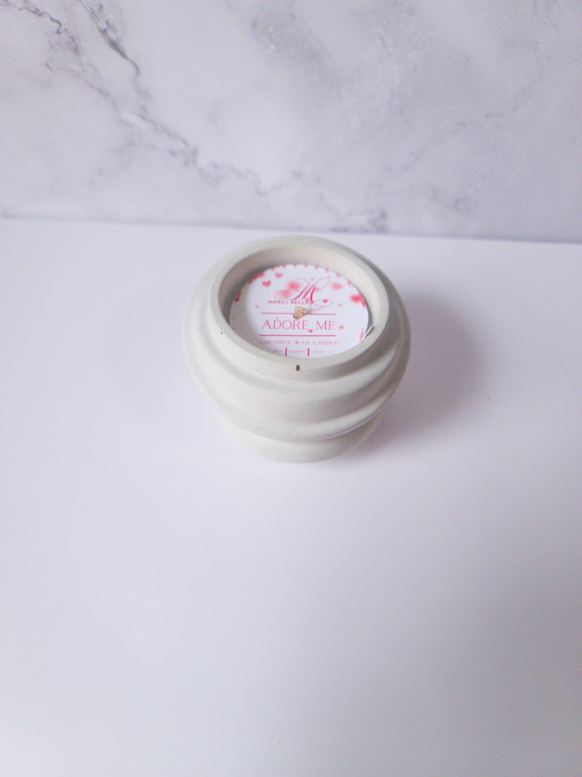 Spiral shaped Candle
Text: Adore me scent. Coconut Apricot wax. 2.5oz.